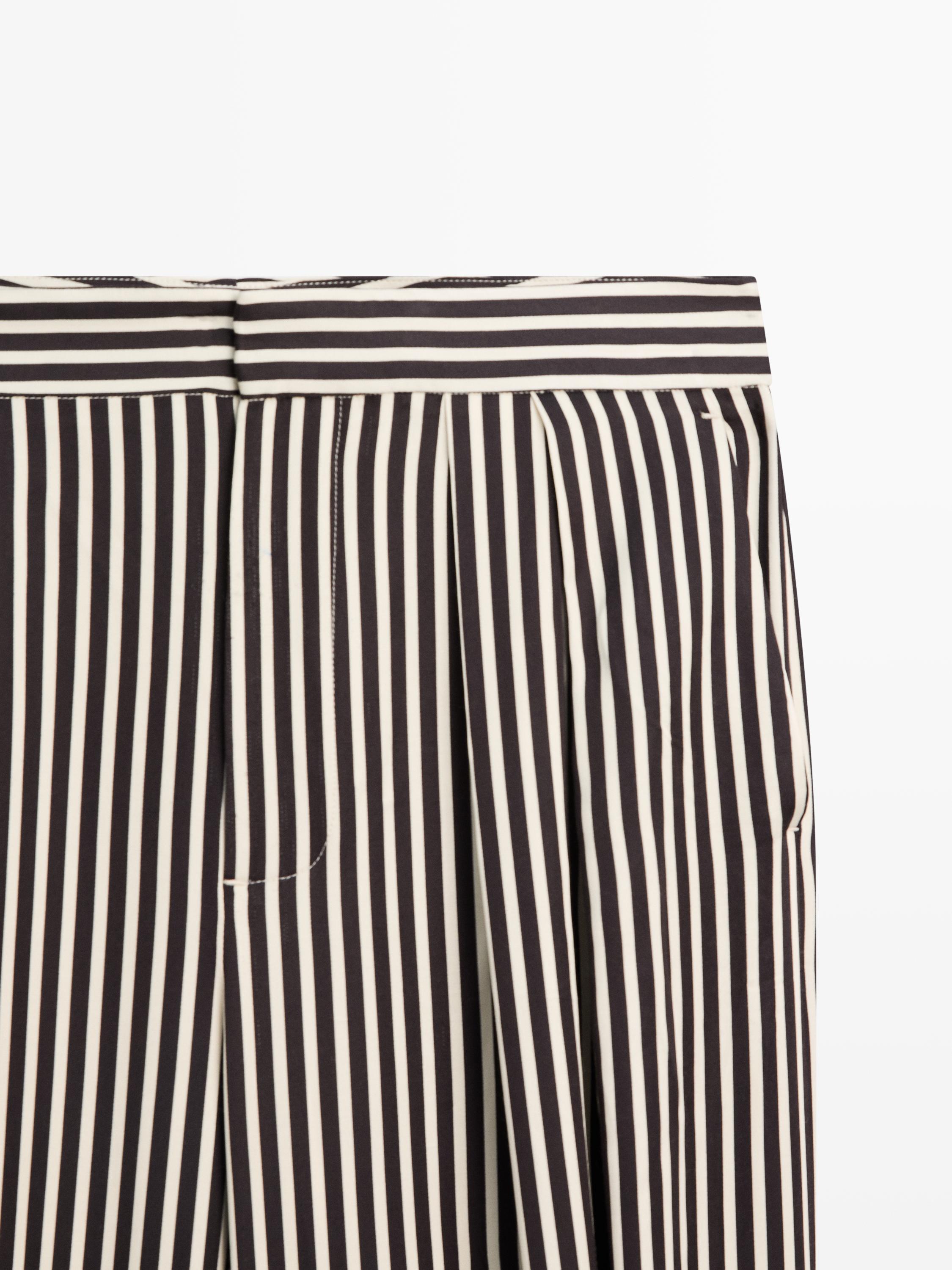 Pantalon bouffant à pinces rayé